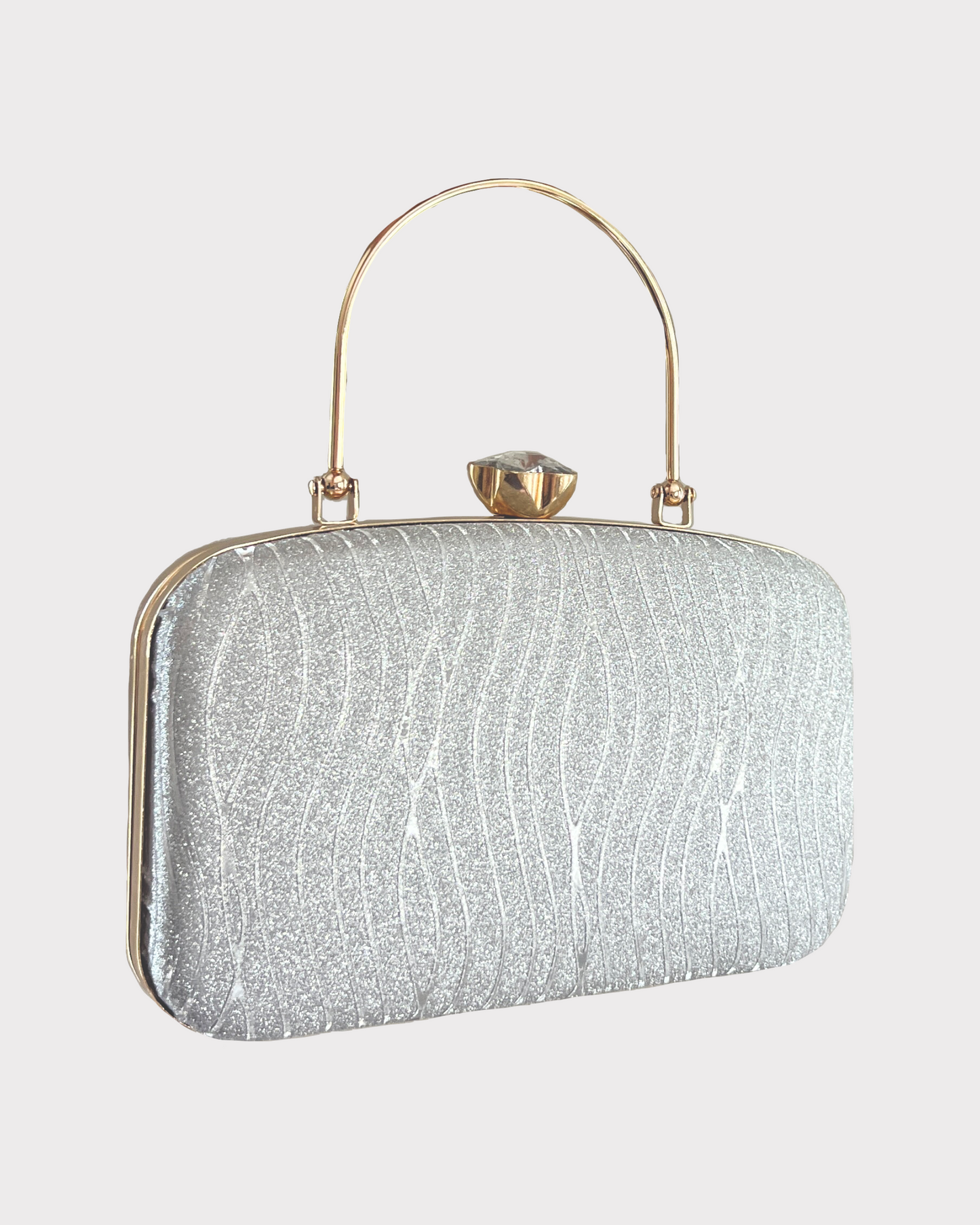 premium silver gold colored clutch purse bag in high quality fabric with crystal rhinestone work with 1 fixed and 1 optional handles and securely locking clutch in an attractive pattern by Oviya