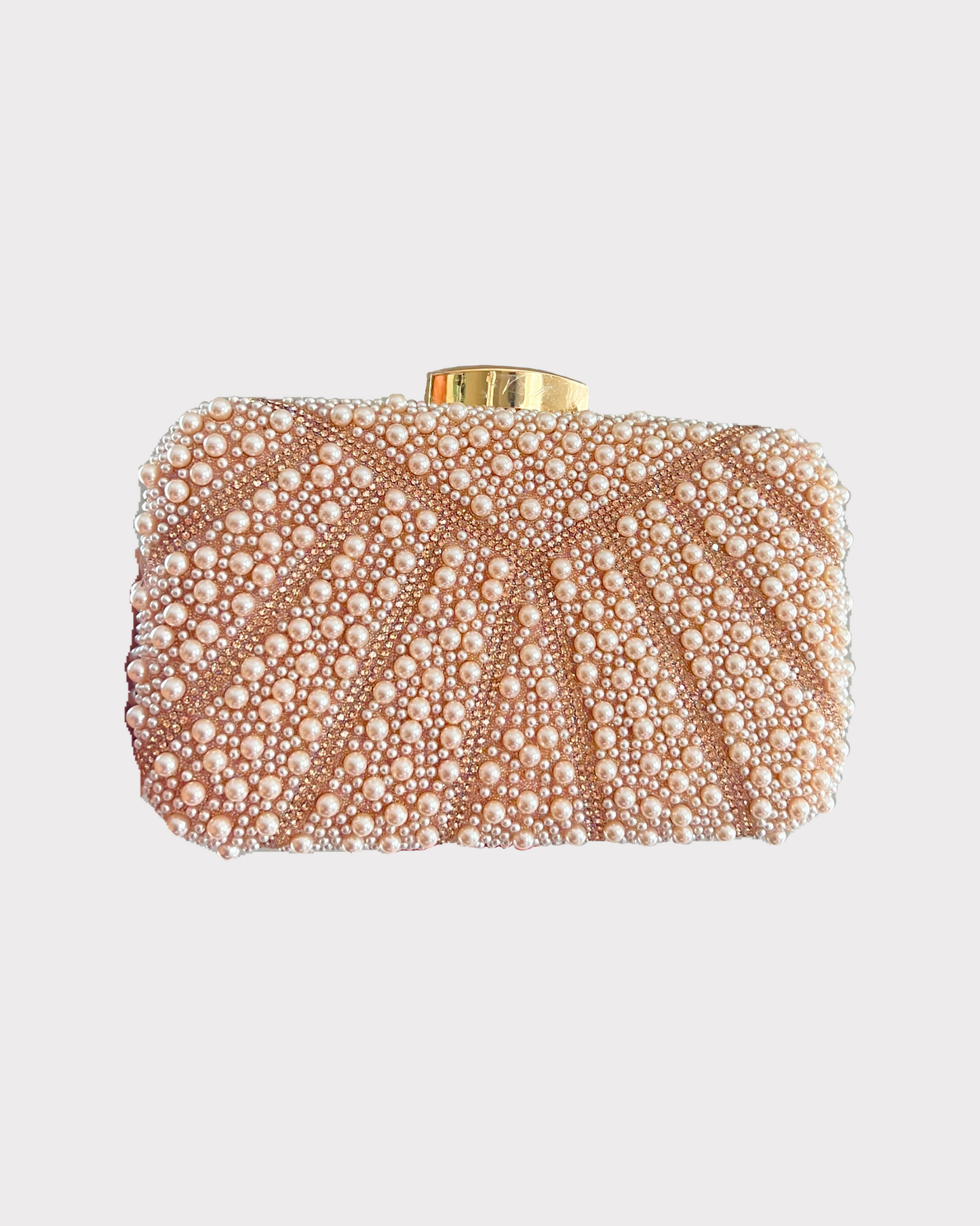 premium rose gold colored pearl clutch bag with rhinestones work in an attractive pattern by Oviya