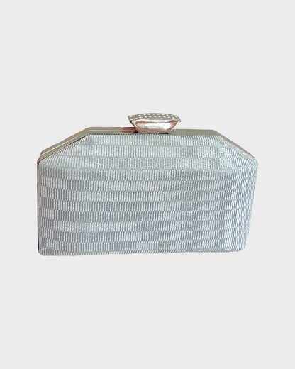 premium silver colored clutch purse bag in high quality fabric with crystal rhinestone work with 2 optional handles and securely locking clutch in an attractive pattern by Oviya 