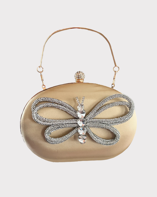 premium gold colored clutch purse bag in high quality fabric with crystal rhinestone work forming a buterfly design, with 2 optional handles and securely locking clutch in an attractive pattern by Oviya 